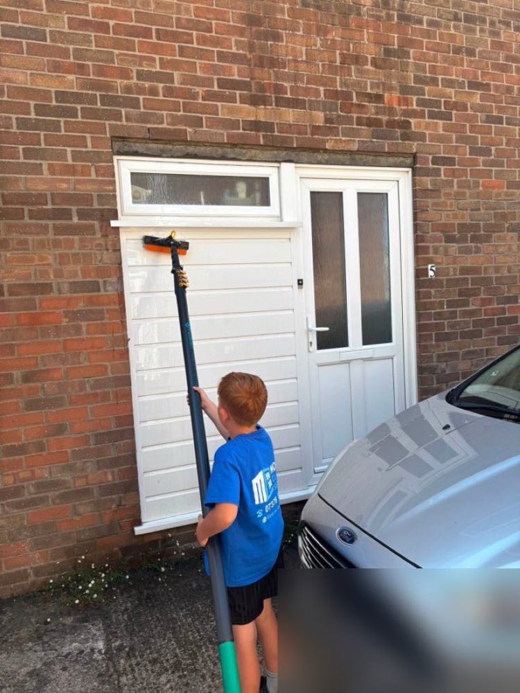 Member of the Morris Cleaning Services crew helping out