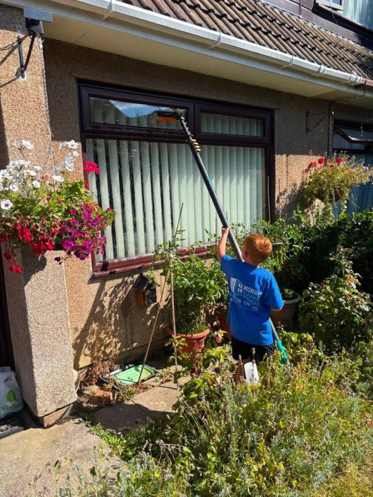 Member of the Morris Cleaning Services crew helping out